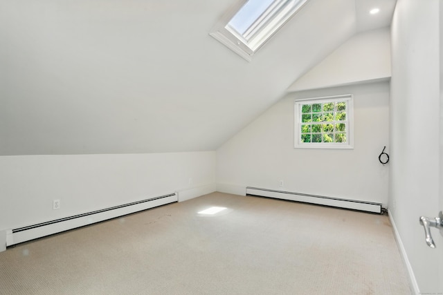 158 Linden Tree Rd, Wilton, CT 06897 - additional living space with a baseboard heating unit, carpet floors, vaulted ceiling, and a skylight