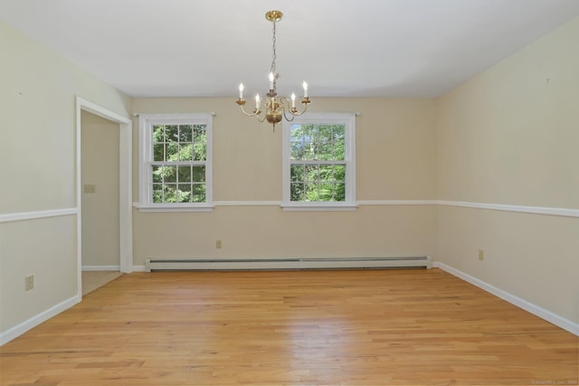 130 Sturbridge Ln, Fairfield, CT 06890 - empty room with a chandelier, plenty of natural light, light wood-style floors, and baseboard heating