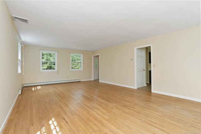 130 Sturbridge Ln, Fairfield, CT 06890 - unfurnished room with a baseboard radiator and light wood-style floors