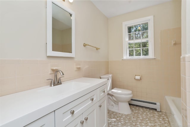 130 Sturbridge Ln, Fairfield, CT 06890 - bathroom featuring baseboard heating, tile walls, vanity, and a wainscoted wall