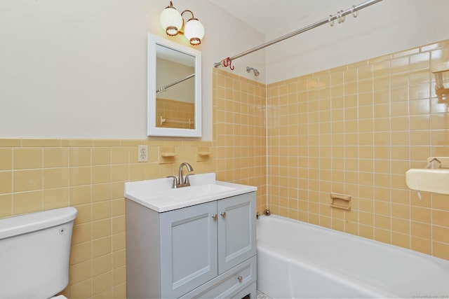 130 Sturbridge Ln, Fairfield, CT 06890 - bathroom featuring tile walls, bathing tub / shower combination, and vanity