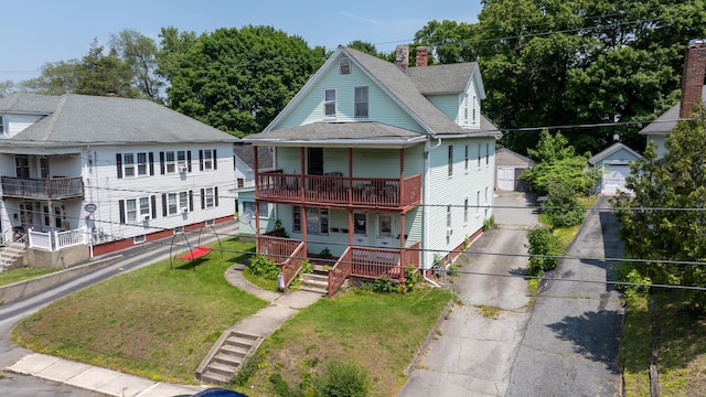 36 Carter St, Killingly, CT 06239 - view of front facade with a front yard, a porch, and a shingled roof