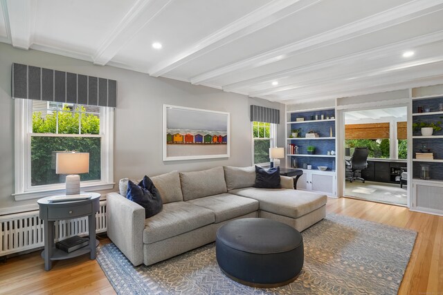 86 Lorma Ave, Trumbull, CT 06611 - living room featuring beam ceiling, an office area, wood finished floors, radiator, and recessed lighting