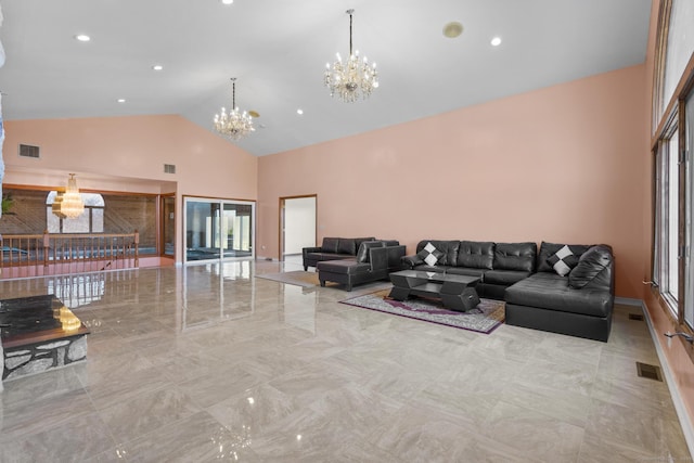 48 Powers Rd, Wallingford, CT 06492 - living area with a chandelier, marble tiled flooring, and high vaulted ceiling