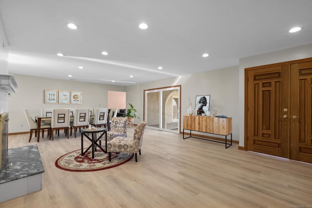 48 Powers Rd, Wallingford, CT 06492 - living room featuring light wood-type flooring and recessed lighting