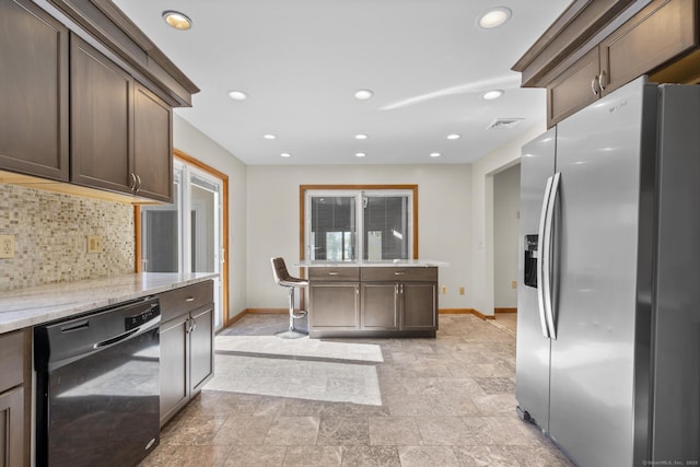48 Powers Rd, Wallingford, CT 06492 - kitchen with stainless steel fridge, dishwasher, tasteful backsplash, stone finish flooring, and light stone countertops