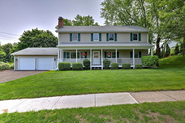 51 Crestwood Rd, Milford, CT 06460 - colonial-style house with covered porch, a chimney, a front lawn, and a garage