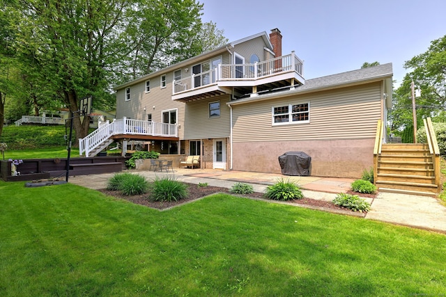 51 Crestwood Rd, Milford, CT 06460 - rear view of house with stairs, a patio area, a chimney, a yard, and a wooden deck