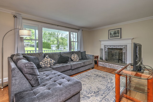 51 Crestwood Rd, Milford, CT 06460 - living area featuring ornamental molding, wood finished floors, and a fireplace