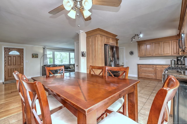 51 Crestwood Rd, Milford, CT 06460 - dining area featuring a ceiling fan, light tile patterned floors, baseboards, and crown molding