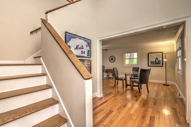 51 Crestwood Rd, Milford, CT 06460 - stairway featuring ornamental molding, wood finished floors, and baseboards