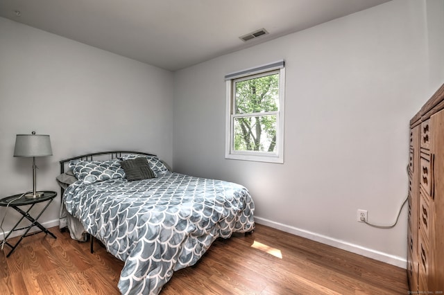 51 Crestwood Rd, Milford, CT 06460 - bedroom with baseboards and wood finished floors