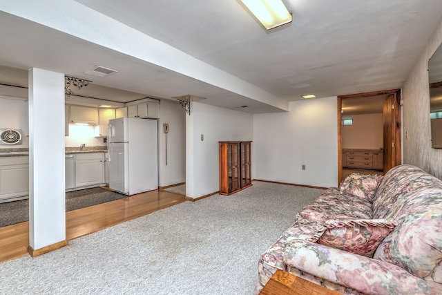 51 Crestwood Rd, Milford, CT 06460 - living room with light carpet and baseboards