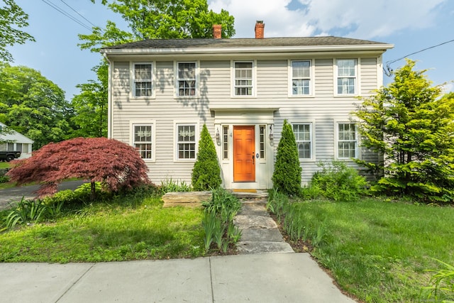 4 Tolland Grn, Tolland, CT 06084 - colonial-style house featuring a chimney