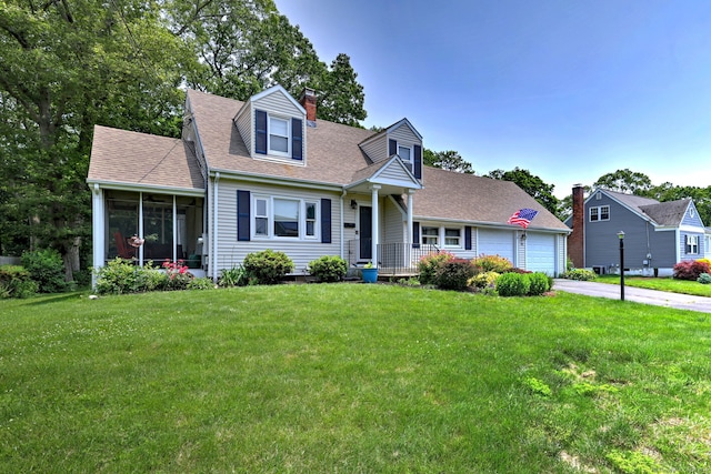 97 Richmond Ave, West Haven, CT 06516 - new england style home with a chimney, a front yard, driveway, and a garage