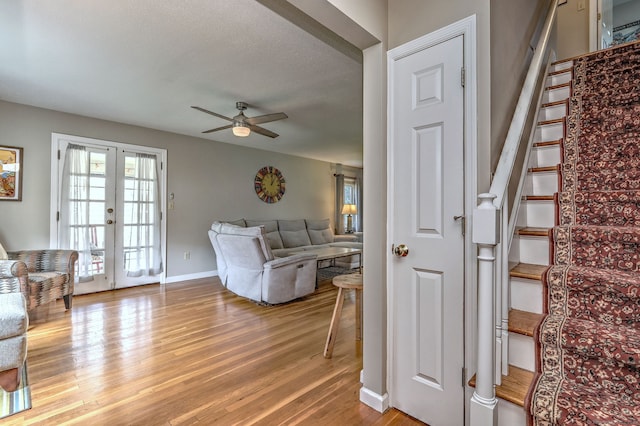 97 Richmond Ave, West Haven, CT 06516 - living room with stairway, light wood-type flooring, ceiling fan, and french doors