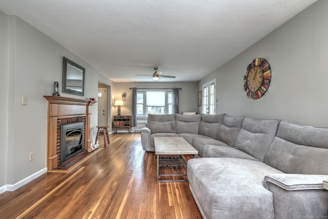 97 Richmond Ave, West Haven, CT 06516 - living room featuring hardwood / wood-style floors, a fireplace, and ceiling fan