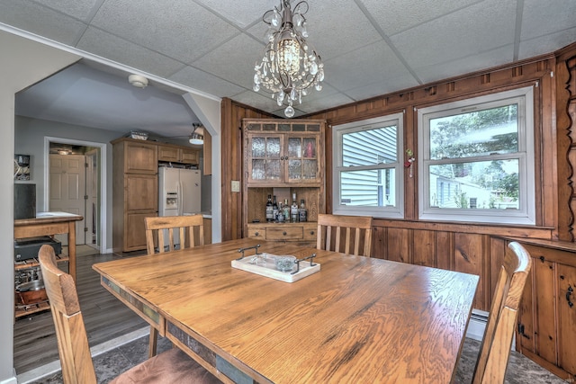 97 Richmond Ave, West Haven, CT 06516 - dining area featuring a chandelier, a drop ceiling, and bar area