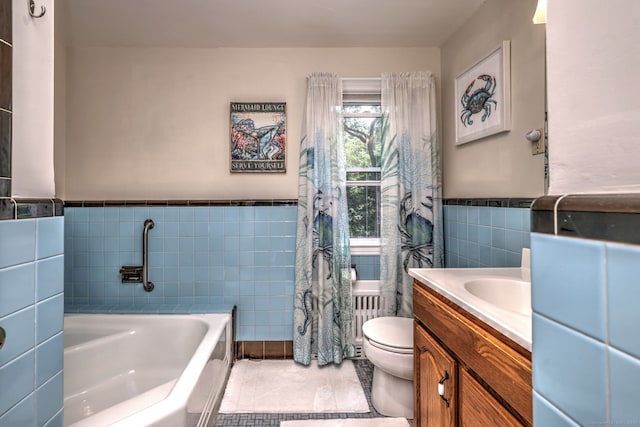97 Richmond Ave, West Haven, CT 06516 - bathroom with tile walls, a garden tub, tile patterned flooring, vanity, and wainscoting