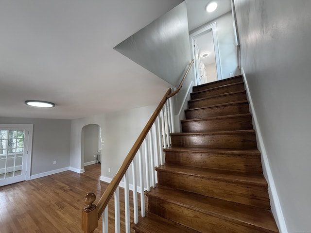 28 Highland Ave, Naugatuck, CT 06770 - staircase featuring arched walkways and wood finished floors