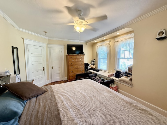451 Robbins Ave, Newington, CT 06111 - bedroom with arched walkways, ornamental molding, baseboards, and a ceiling fan