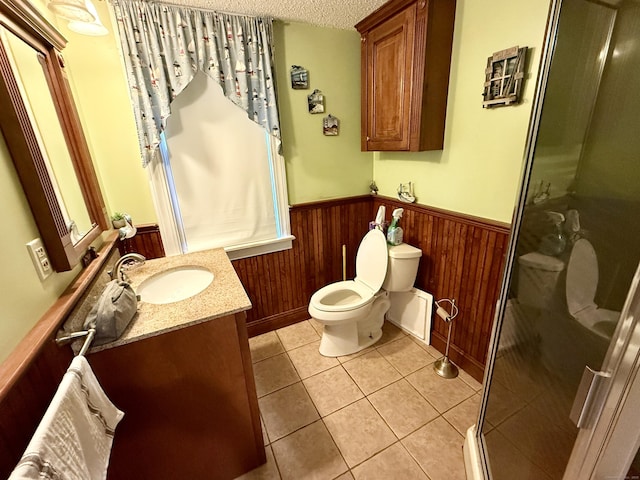 451 Robbins Ave, Newington, CT 06111 - full bathroom with toilet, wainscoting, vanity, a stall shower, and a textured ceiling