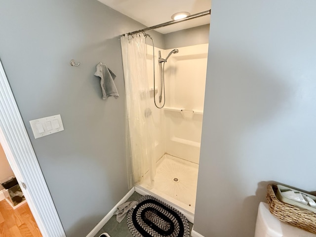 451 Robbins Ave, Newington, CT 06111 - full bath featuring curtained shower and baseboards