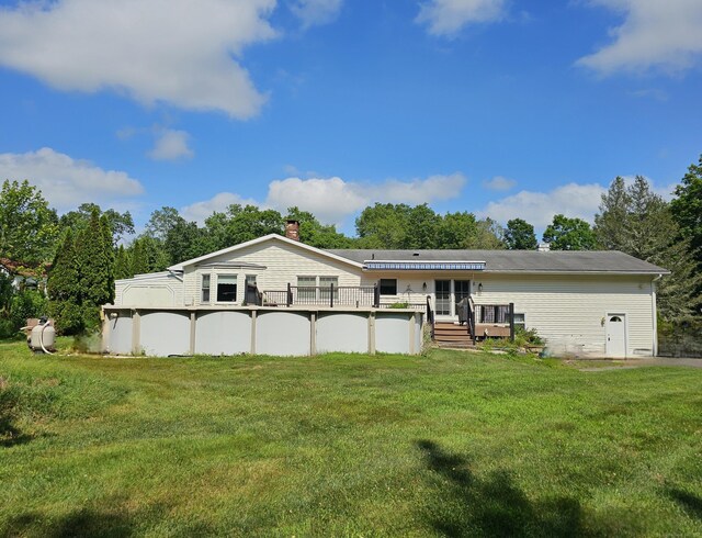 105 Minortown Rd, Woodbury, CT 06798 - back of house featuring a deck, an outdoor pool, a yard, and a chimney