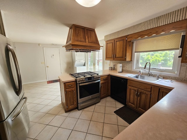 105 Minortown Rd, Woodbury, CT 06798 - kitchen featuring appliances with stainless steel finishes, custom range hood, light tile patterned flooring, and light countertops