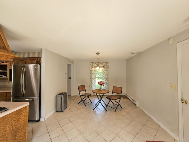 105 Minortown Rd, Woodbury, CT 06798 - dining area featuring a baseboard radiator and light tile patterned flooring