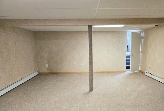 105 Minortown Rd, Woodbury, CT 06798 - finished basement with carpet floors, a baseboard heating unit, a paneled ceiling, and stairway