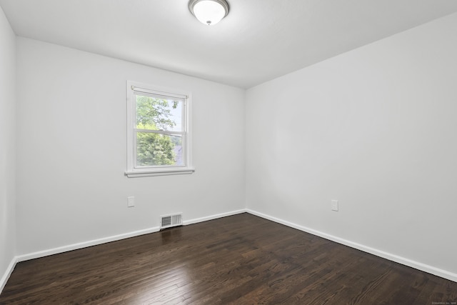 22 Allerton Rd, Naugatuck, CT 06770 - spare room with dark wood-style flooring and baseboards