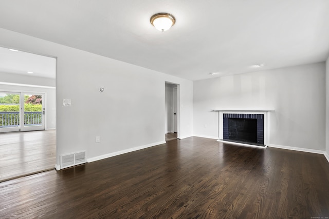 22 Allerton Rd, Naugatuck, CT 06770 - unfurnished living room with a brick fireplace, wood finished floors, and baseboards