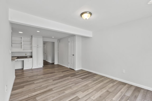 22 Allerton Rd, Naugatuck, CT 06770 - unfurnished living room with wood finished floors, recessed lighting, and baseboards