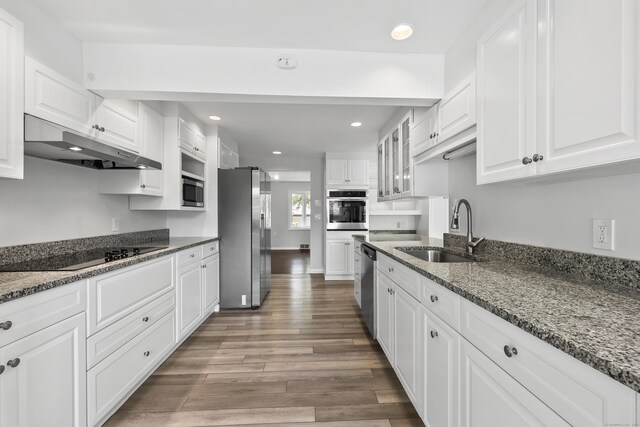 22 Allerton Rd, Naugatuck, CT 06770 - kitchen featuring appliances with stainless steel finishes, under cabinet range hood, a sink, recessed lighting, and wood finished floors