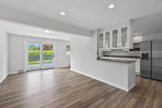 22 Allerton Rd, Naugatuck, CT 06770 - kitchen with appliances with stainless steel finishes, dark wood finished floors, white cabinets, glass insert cabinets, and baseboards