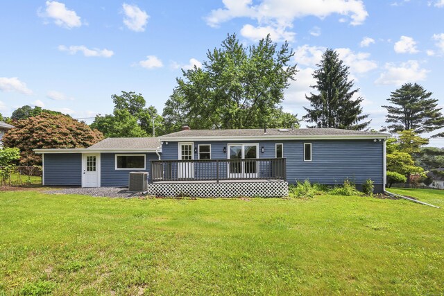 22 Allerton Rd, Naugatuck, CT 06770 - back of property with a wooden deck, central air condition unit, a yard, and a chimney