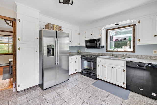 136 Wheeler Rd, Monroe, CT 06468 - kitchen featuring black appliances, white cabinets, a baseboard heating unit, and ornamental molding