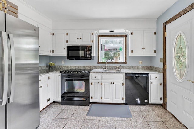 136 Wheeler Rd, Monroe, CT 06468 - kitchen featuring black appliances, white cabinetry, light stone counters, granite tiled floors, and crown molding