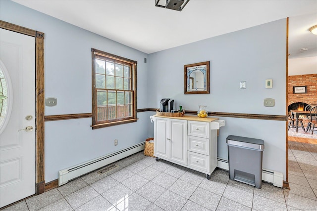 136 Wheeler Rd, Monroe, CT 06468 - bar featuring a baseboard radiator and granite floors