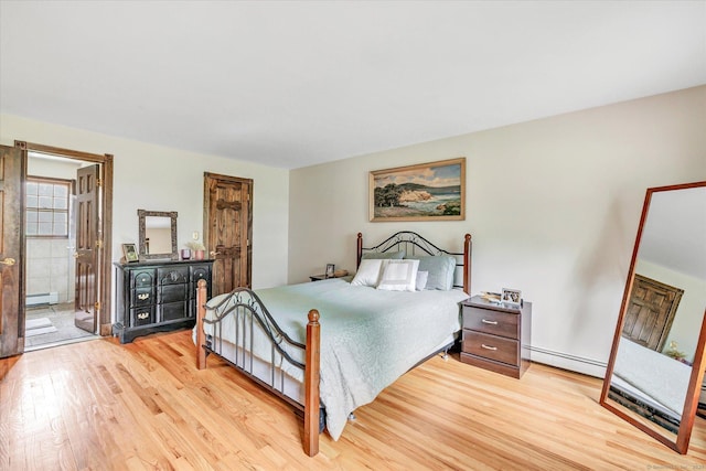 136 Wheeler Rd, Monroe, CT 06468 - bedroom featuring light wood finished floors and a baseboard radiator