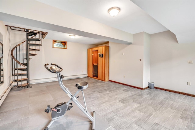 136 Wheeler Rd, Monroe, CT 06468 - workout area with baseboards and light wood finished floors