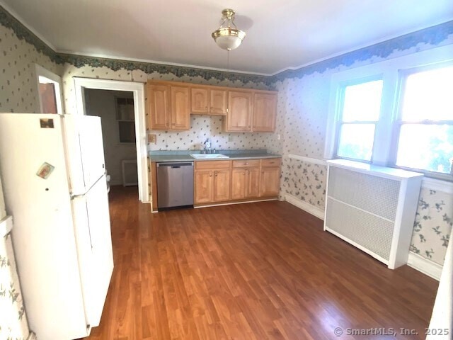 242 Pearl St, Enfield, CT 06082 - kitchen featuring dishwasher, wallpapered walls, freestanding refrigerator, a sink, and dark wood-style floors