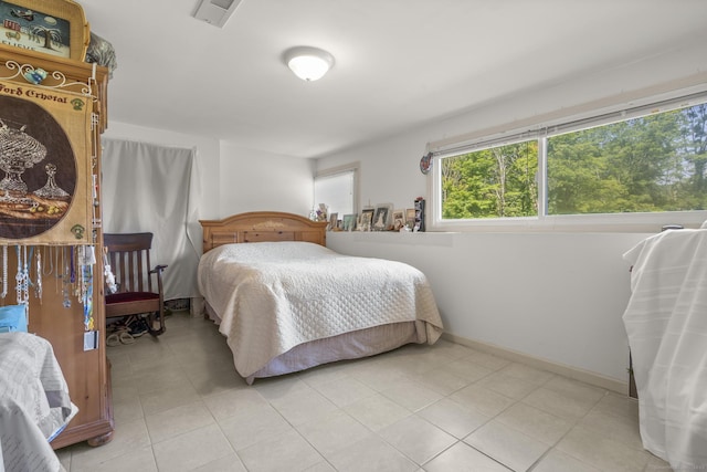 408 Stage Coach Rd, Durham, CT 06422 - bedroom featuring light tile patterned flooring and baseboards