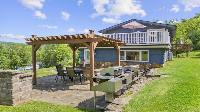 408 Stage Coach Rd, Durham, CT 06422 - back of property featuring area for grilling, a yard, a patio, a deck, and a pergola