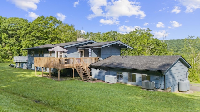 408 Stage Coach Rd, Durham, CT 06422 - back of house with roof with shingles, a lawn, stairs, and a chimney