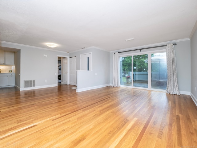 3 Orange Ln Unit 3, Ridgefield, CT 06877 - unfurnished living room featuring light wood-type flooring and ornamental molding