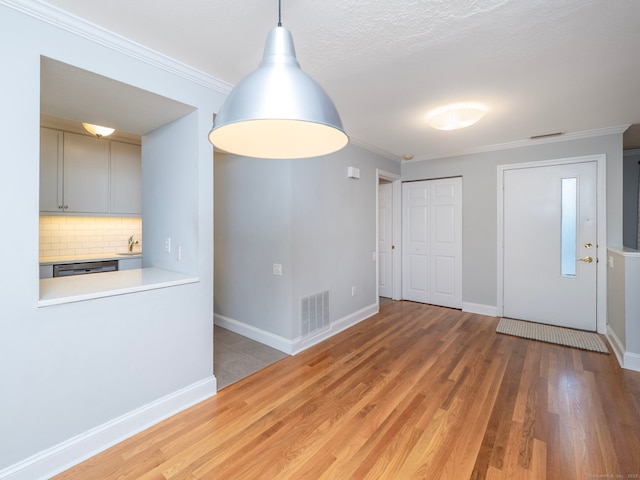 3 Orange Ln Unit 3, Ridgefield, CT 06877 - unfurnished dining area featuring wood finished floors and ornamental molding