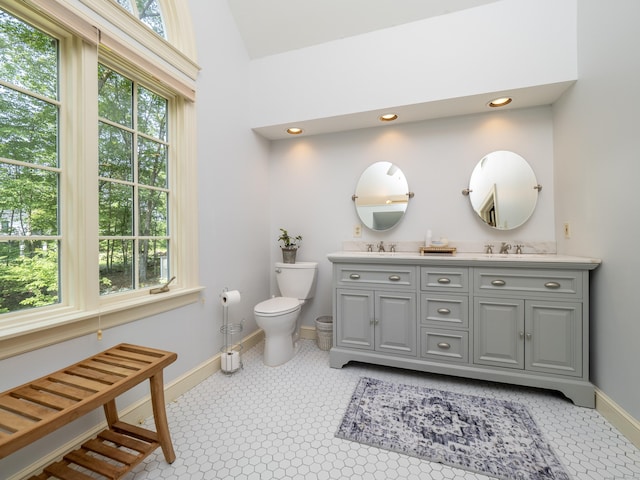 104 Scarlet Oak Dr, Wilton, CT 06897 - bathroom with baseboards, double vanity, toilet, and recessed lighting