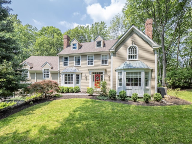 104 Scarlet Oak Dr, Wilton, CT 06897 - view of front of home with a chimney and a front yard